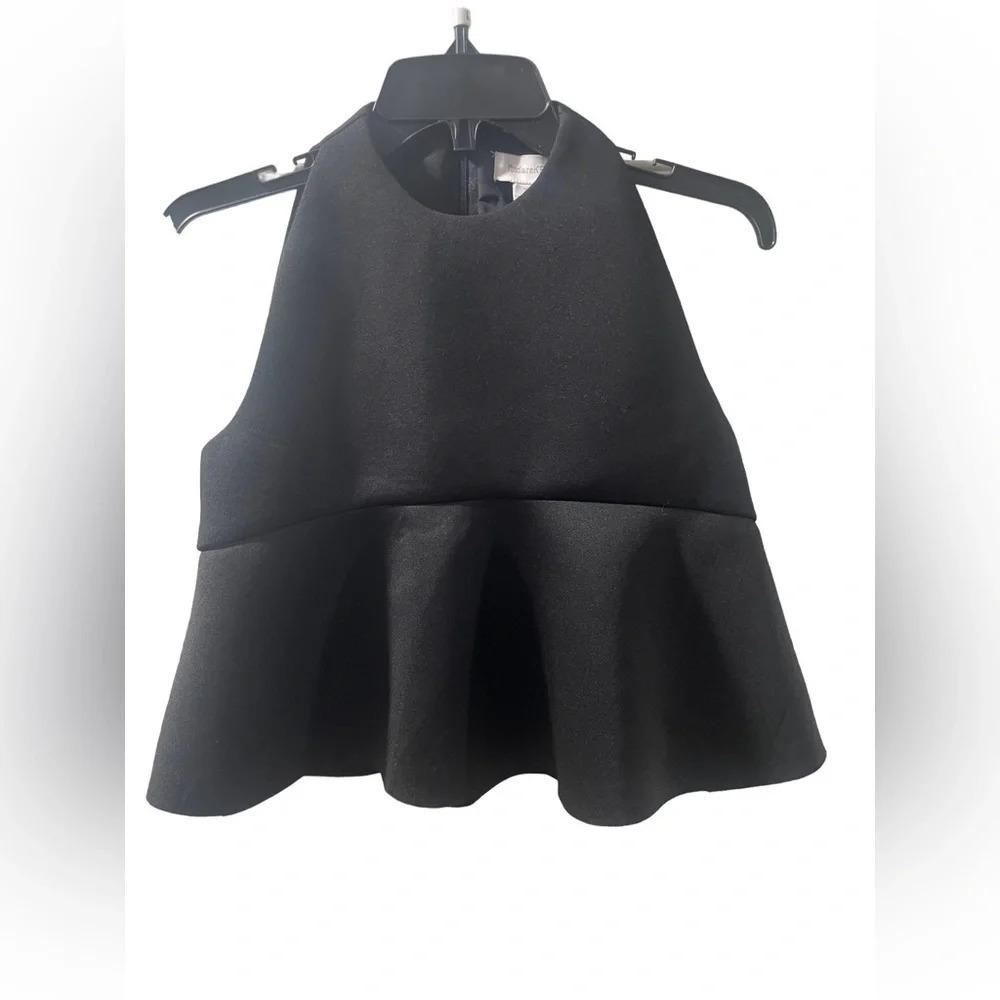 Finders Keepers Black Peplum Top Size Small. Lined on top.